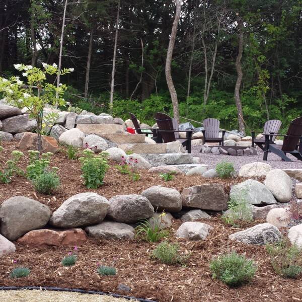 general landscaping with decorative rock and planting beds