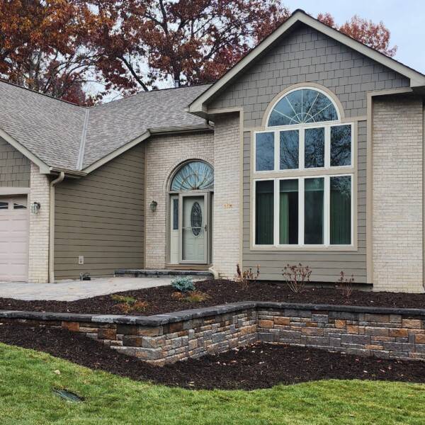 Retaining Wall Installation with block wall and graded landscape